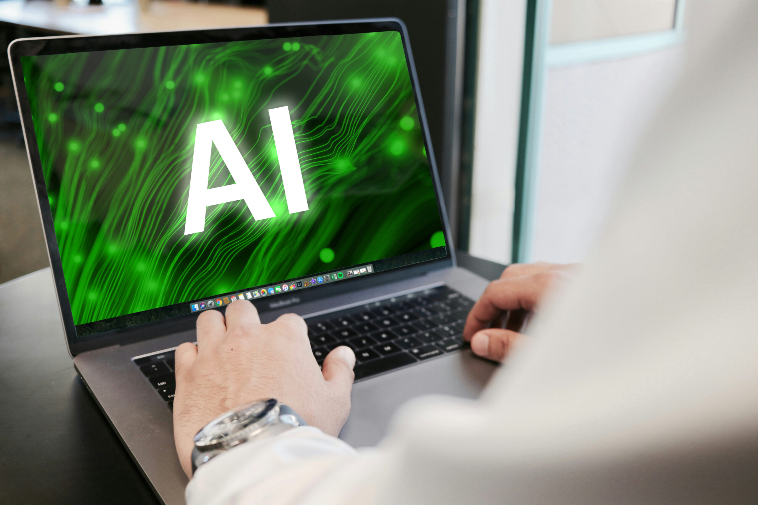 A person using AI on their computer.